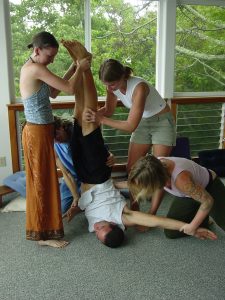 Participating in highly unconventional educational exercises involving body awareness, consciousness and movement on Kauai in 2004.